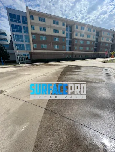 Cleaned concrete plaza at a multi-story commercial building in Richardson, TX