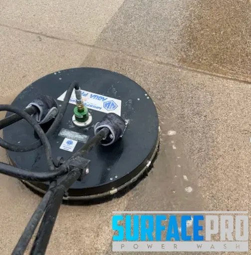 Surface cleaner removing grime from concrete flatwork in Plano, TX