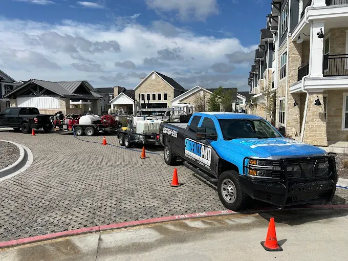Surface Pro Power Wash truck and rig at an apartment community in McKinney, TX