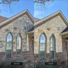 Before and after soft wash of a stone gable with arched windows restoring warm cream stone color in Plano, TX